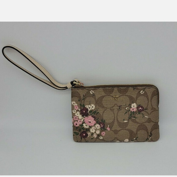 Coach Handbags - Coach Tan Floral Wristlet